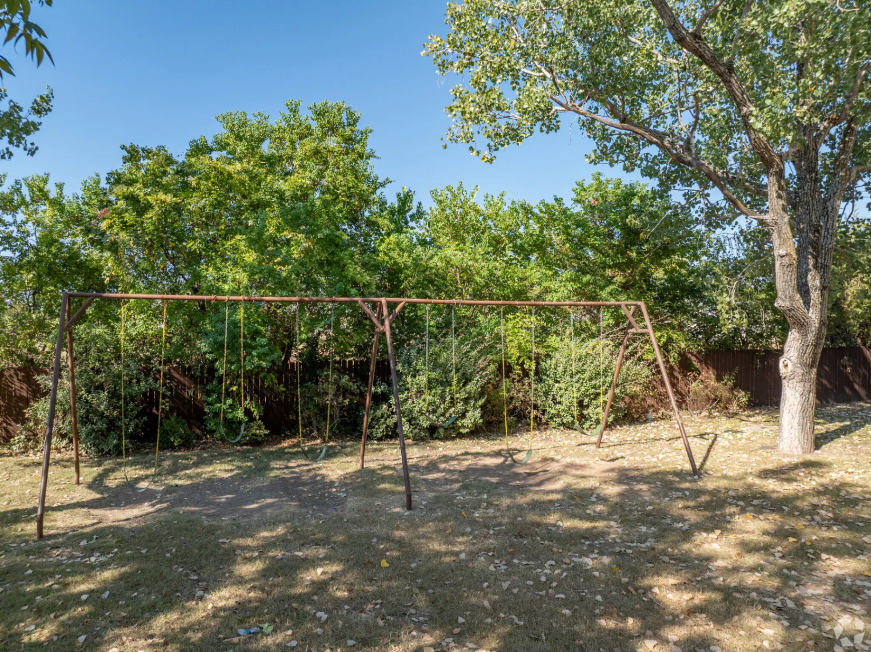 Outdoor play area with swingset
